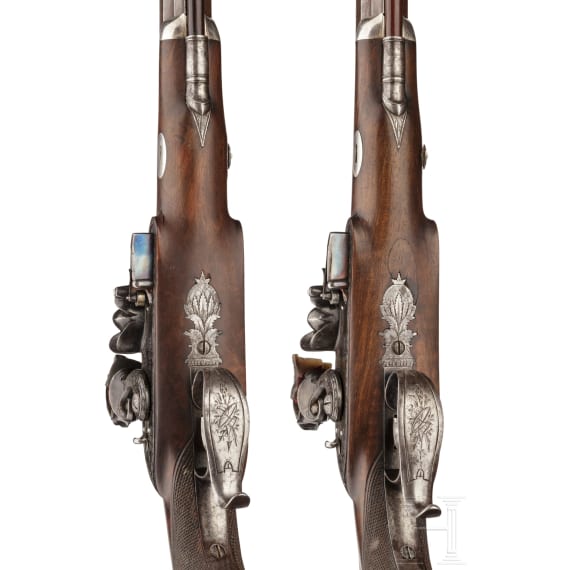 A cased pair of flintlock pistols with a detachable stock, H. W. Mortimer & Co. of London, circa 1810