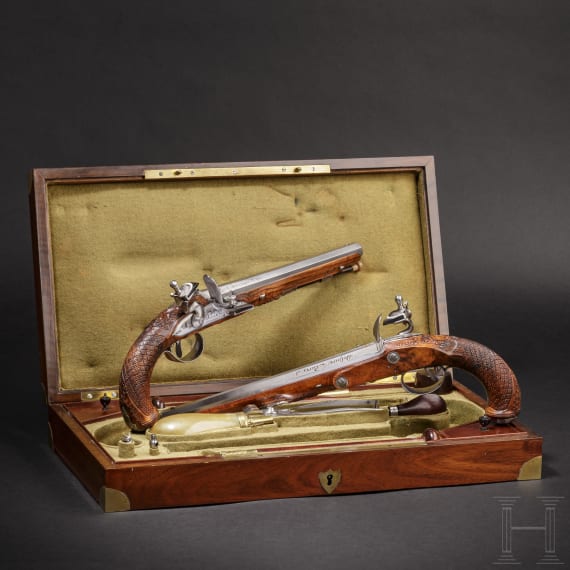 A pair of flintlock pistols by Delpire in Paris, circa 1810