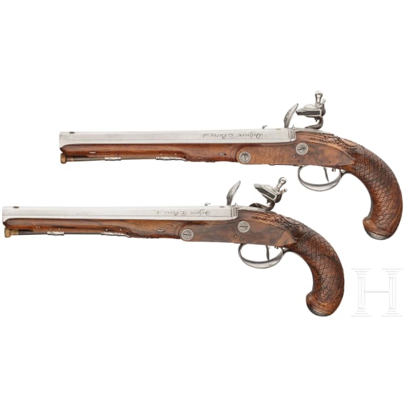 A pair of flintlock pistols by Delpire in Paris, circa 1810