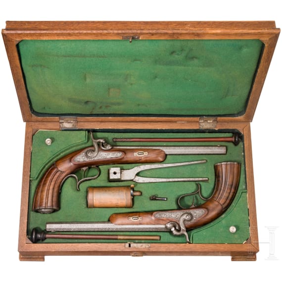 A cased pair of percussion pistols, G. O. Nerkl, Grossenhain/Saxony, circa 1860