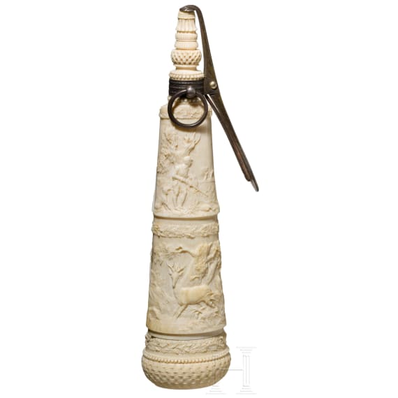A German silver-mounted powder flask of ivory, mid-19th century