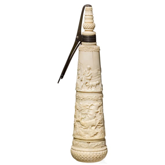 A German silver-mounted powder flask of ivory, mid-19th century