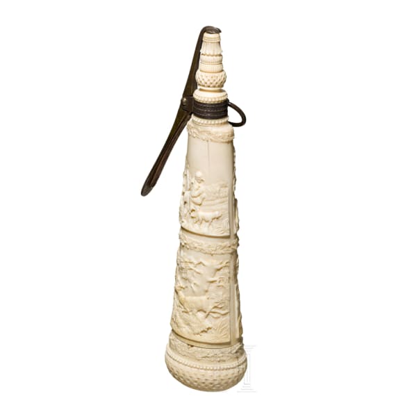 A German silver-mounted powder flask of ivory, mid-19th century