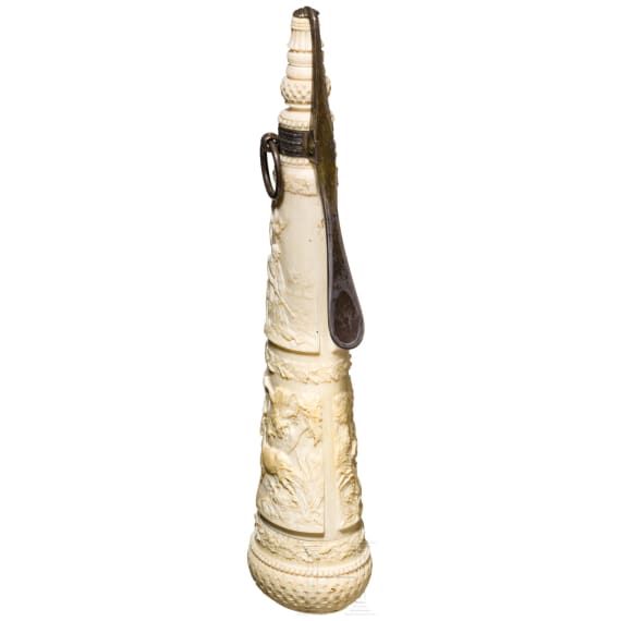 A German silver-mounted powder flask of ivory, mid-19th century