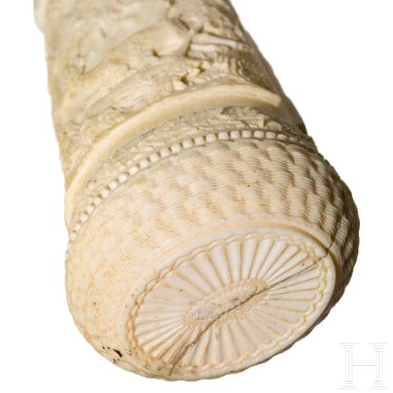 A German silver-mounted powder flask of ivory, mid-19th century
