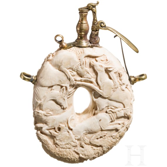 A carved German hunting powder flask (ivory) in the style of the Maucher workshop, 19th century