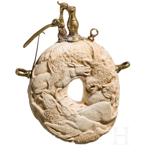 A carved German hunting powder flask (ivory) in the style of the Maucher workshop, 19th century