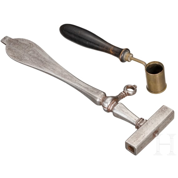 A German wheel-lock spanner and a powder measure, 16th/17th century