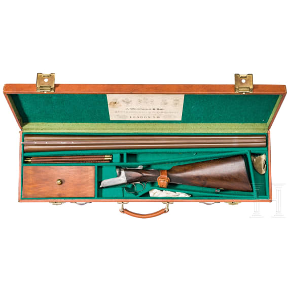A cased side-by-side shotgun by Woodward & Son