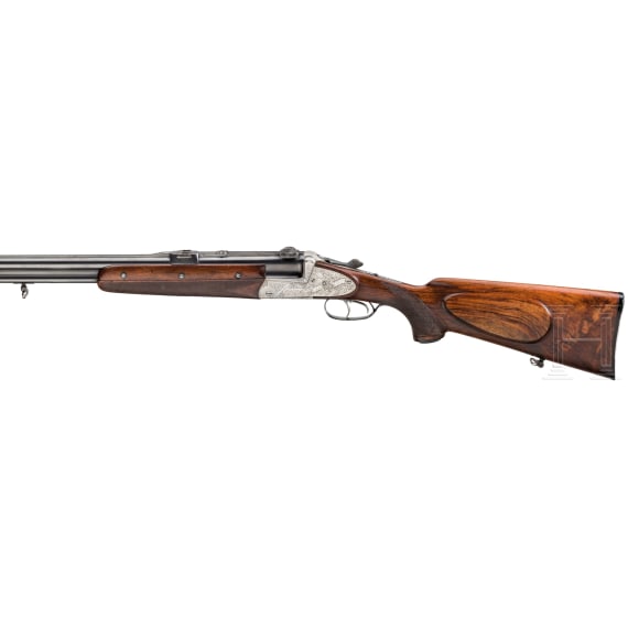 A Winkler, Ferlach, over/under combination rifle, with three barrel sets