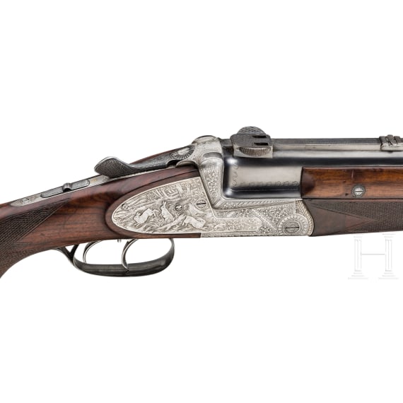 A Winkler, Ferlach, over/under combination rifle, with three barrel sets