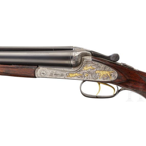 A Merkel double-rifle with Zeiss scope, and a side-by-side shotgun barrel set with case