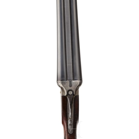 A Merkel double-rifle with Zeiss scope, and a side-by-side shotgun barrel set with case