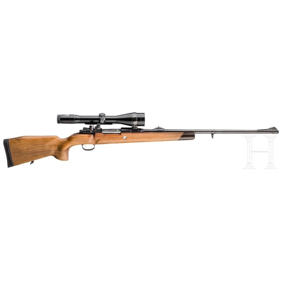 A M 98 repeating rifle with scope