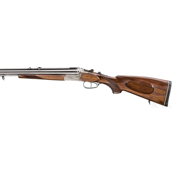 A Simson three-barrel rifle-shotgun with Kahles scope