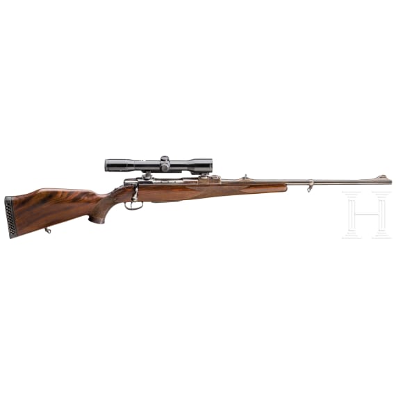 A Sauer 80 repeating rifle, with Hensold scope