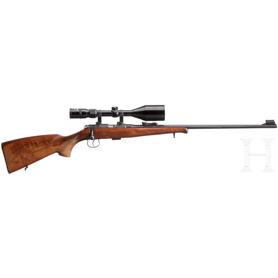 A Rno Arms M 2-E repeating rifle with Hunter scope