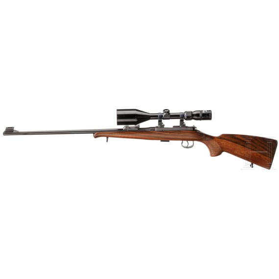 A Rno Arms M 2-E repeating rifle with Hunter scope