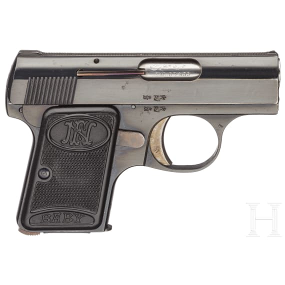 A FN M Baby with holster