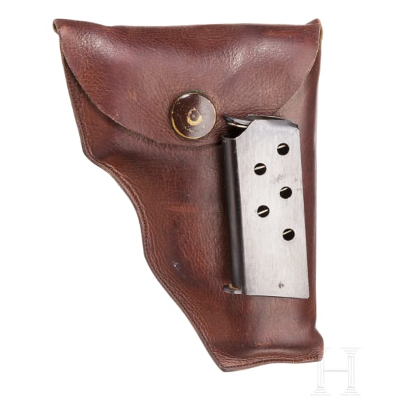 A FN M Baby with holster