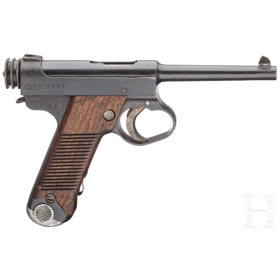 A Nambu Type 14 with large trigger guard and holster
