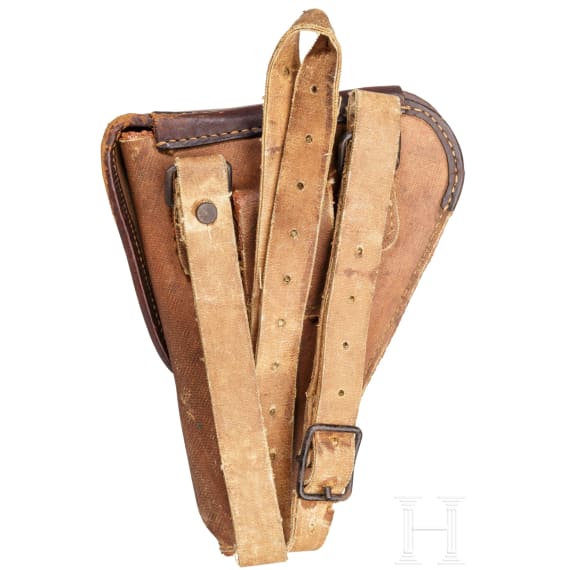 A Nambu Type 14 with large trigger guard and holster