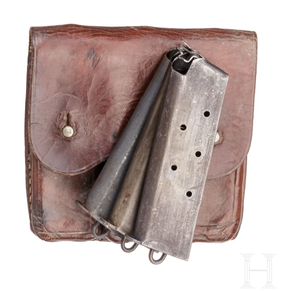 A Kongsberg M 1914 with holster and ammunition pouch