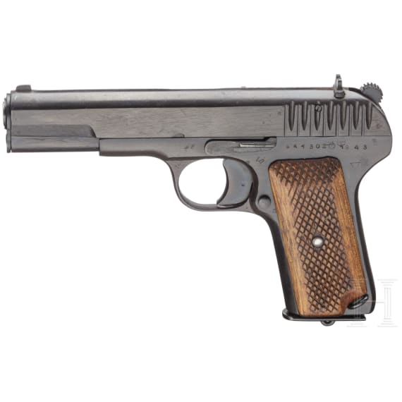 A Tokarev TT 33 with holster and Magazines with matching numbers