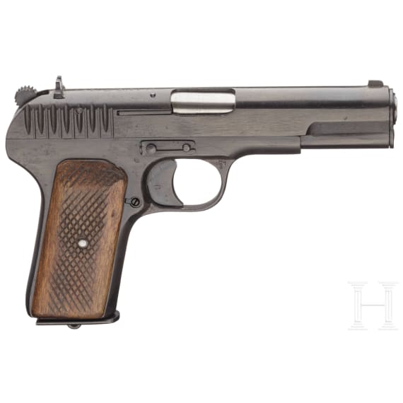 A Tokarev TT 33 with holster and Magazines with matching numbers
