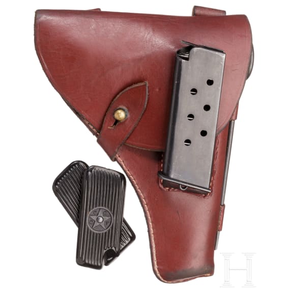 A Tokarev TT 33 with holster and Magazines with matching numbers