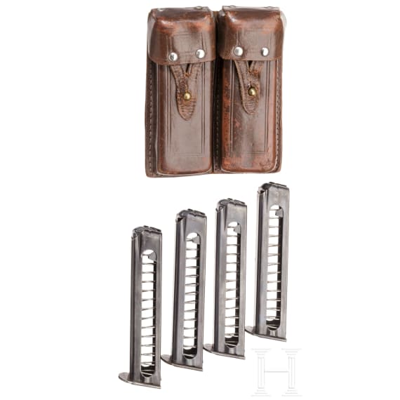 A Stechkin APS with two stocks an a double magazine pouch
