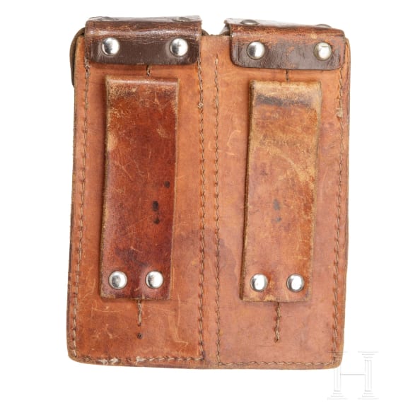 A Stechkin APS with two stocks an a double magazine pouch