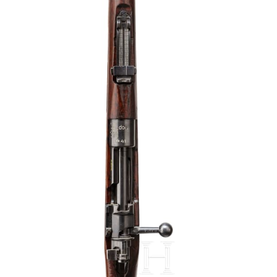 A rifle "G24 (t), code "dou - 41"