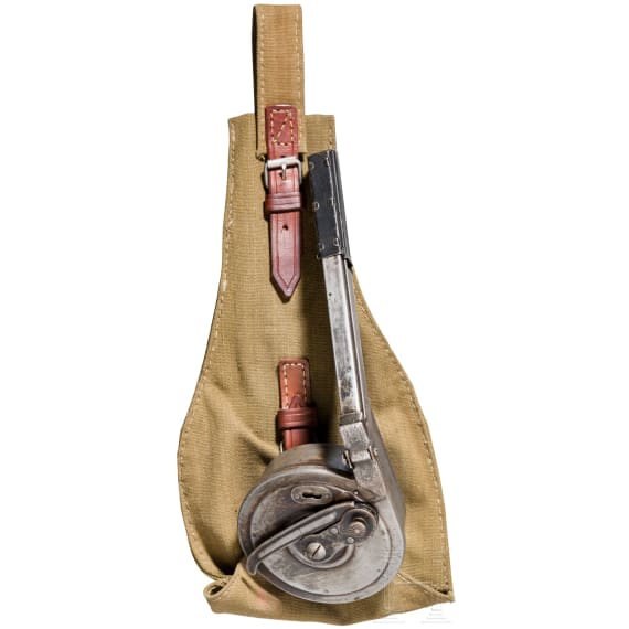 A snail drum magazine for an Artillery Luger, 2nd pattern, with dust cover