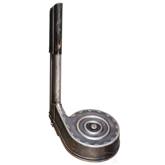 A snail drum magazine for an Artillery Luger, 2nd pattern, with dust cover
