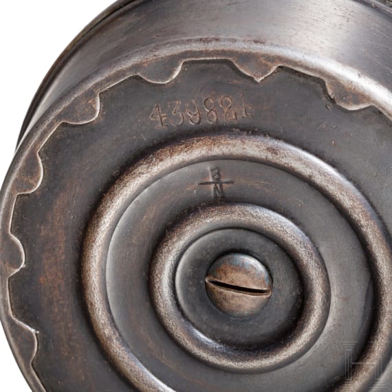 A snail drum magazine for an Artillery Luger, 2nd pattern, with dust cover