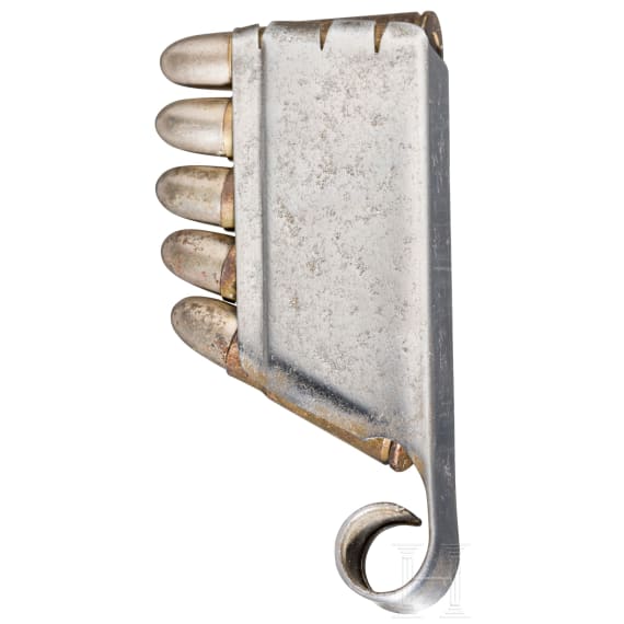 A cartridge clip with five cartridges cal. 6,5 mm Bergmann No. 3