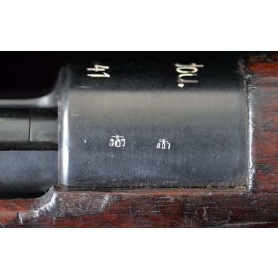 A rifle "G24 (t), code "dou - 41"