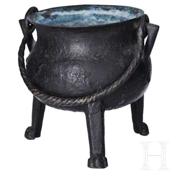 A small German bronze cauldron, dated 1557