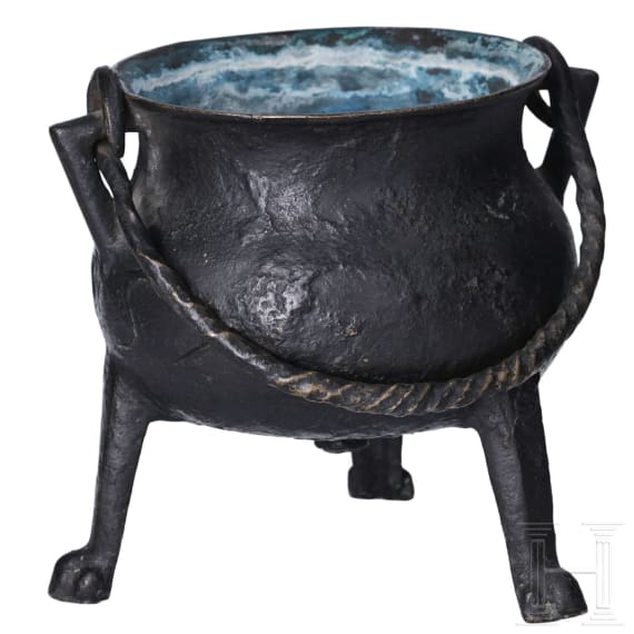 A small German bronze cauldron, dated 1557