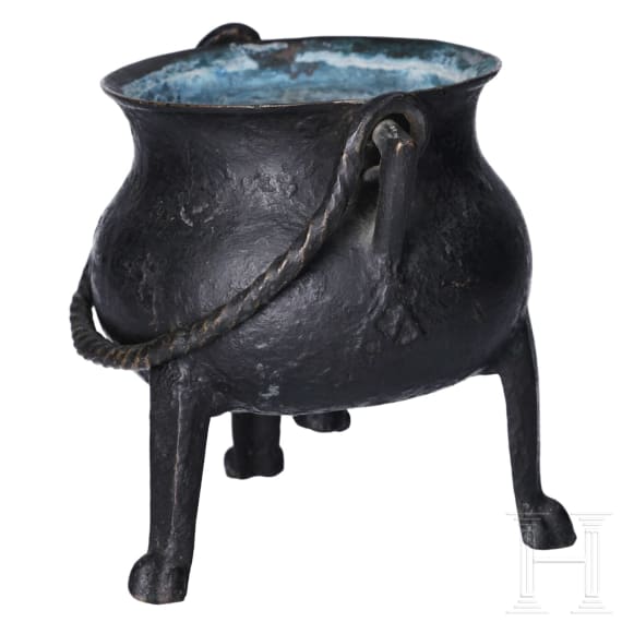 A small German bronze cauldron, dated 1557