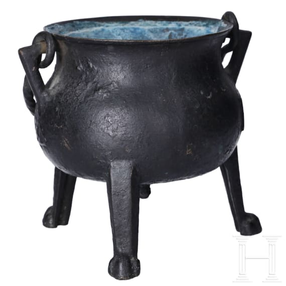 A small German bronze cauldron, dated 1557