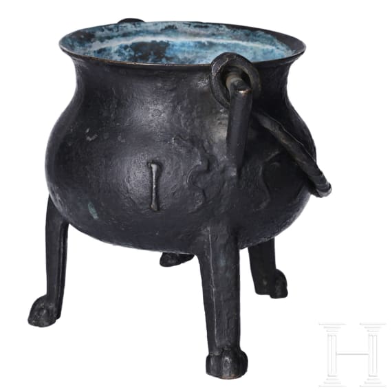 A small German bronze cauldron, dated 1557