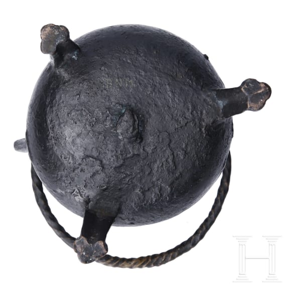 A small German bronze cauldron, dated 1557