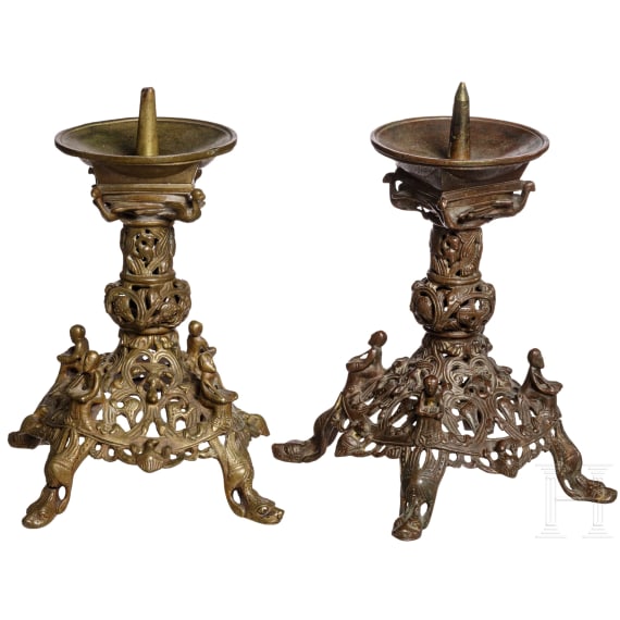 A pair of pricket candle holders, historicism in Romanesque style