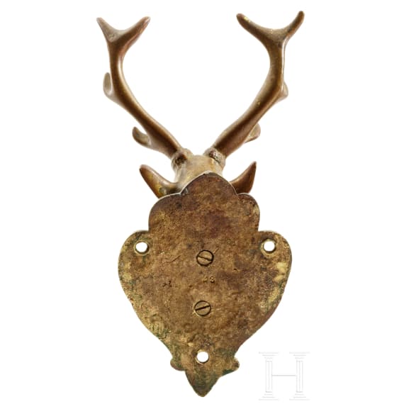 A Nuremberg Baroque-style wall hook in the shape of a deer head, circa 1850