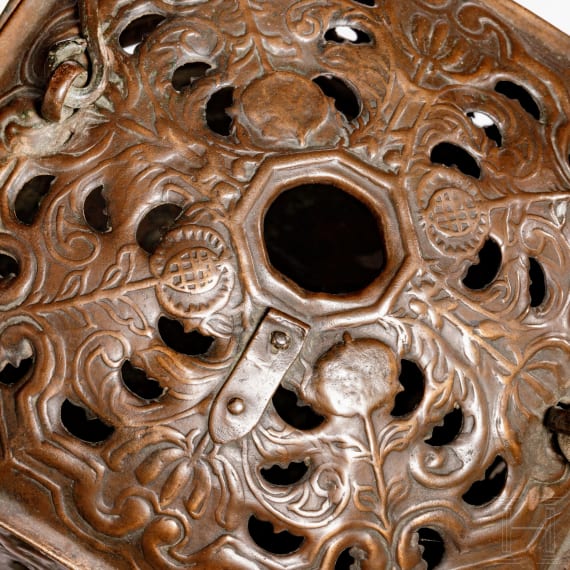An ornate northern German copper foot warmer, Hannover/Brunswick, circa 1680/90