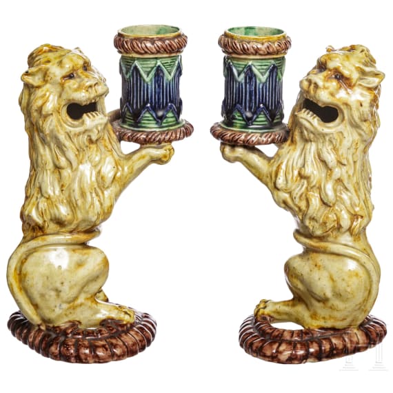 A pair of probably French Fayance lions as a candle holder, 19th century