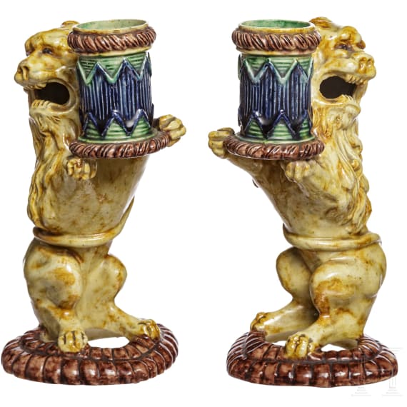 A pair of probably French Fayance lions as a candle holder, 19th century