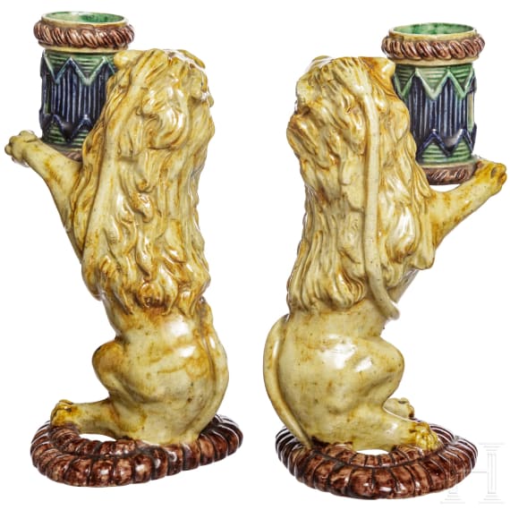 A pair of probably French Fayance lions as a candle holder, 19th century